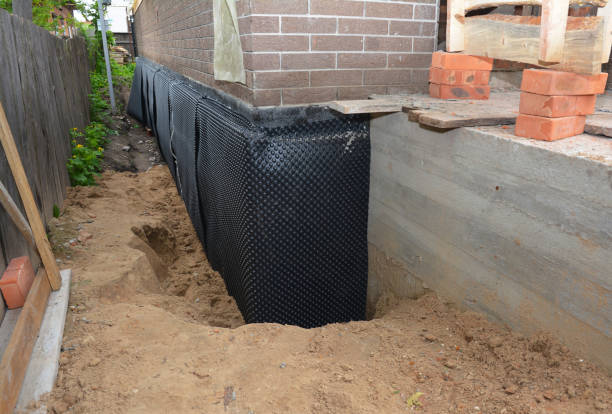 Happy homeowners after waterproofing job in Jenera